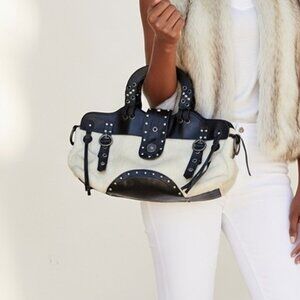 Leather and calf hair bag by Renato Minelli.